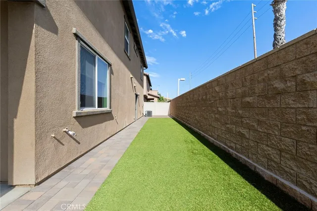 a view of a backyard with golf course