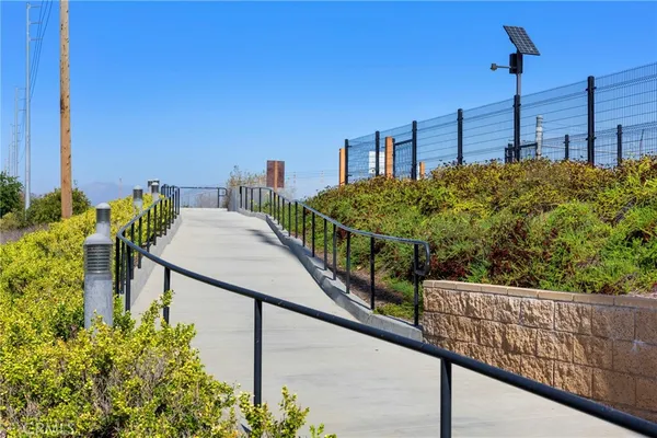 a view of a balcony with chairs