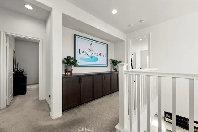 a view of a hallway with workspace