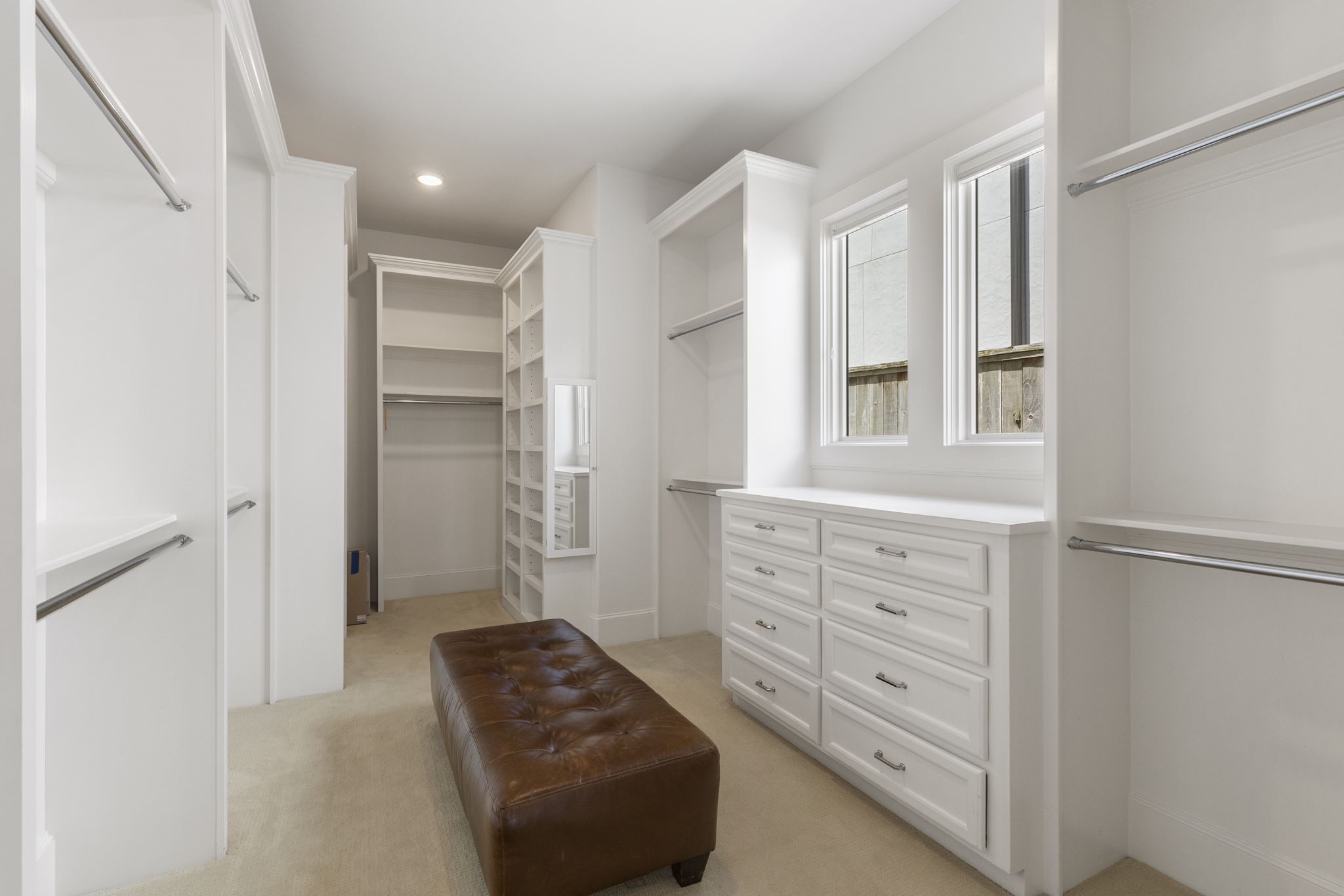 6806 West Warwick Lake Lane Spring, TX 77389 - Photo 24 of 50 a bedroom with a bed and a dresser