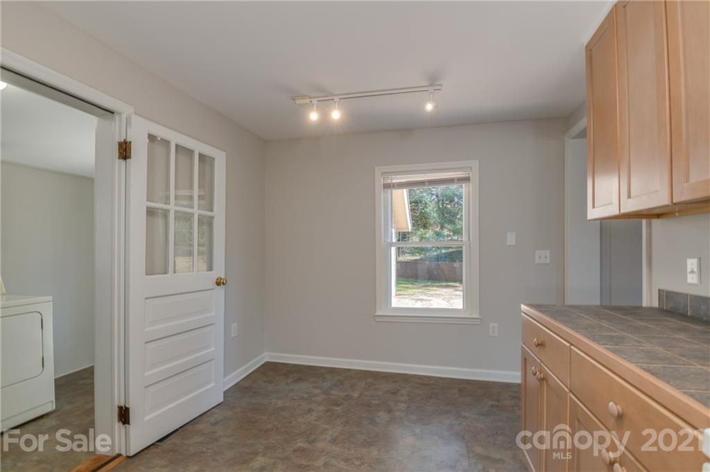 6149 Peniel Road Tryon, NC 28782 - Photo 14 of 48 a view of an empty room with a window