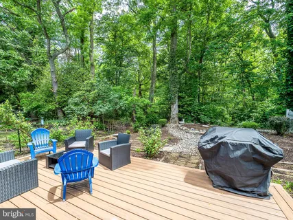 a view of a couches on the deck and patio