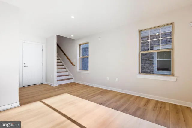 a view of entryway with wooden floor