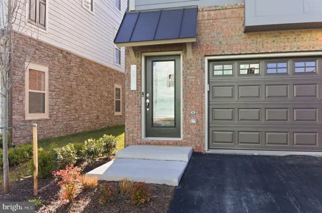 a view of a building with a street