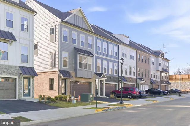 a large building with a yard in front of it