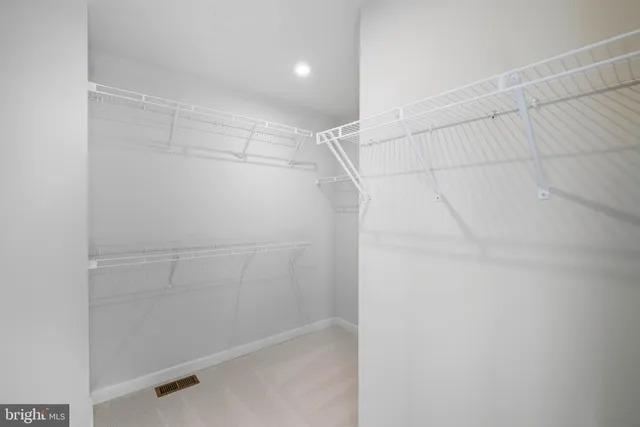 a bathroom with a sink a toilet and bathtub