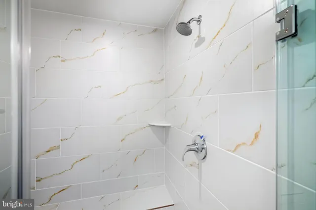 a view of a two chairs in the balcony