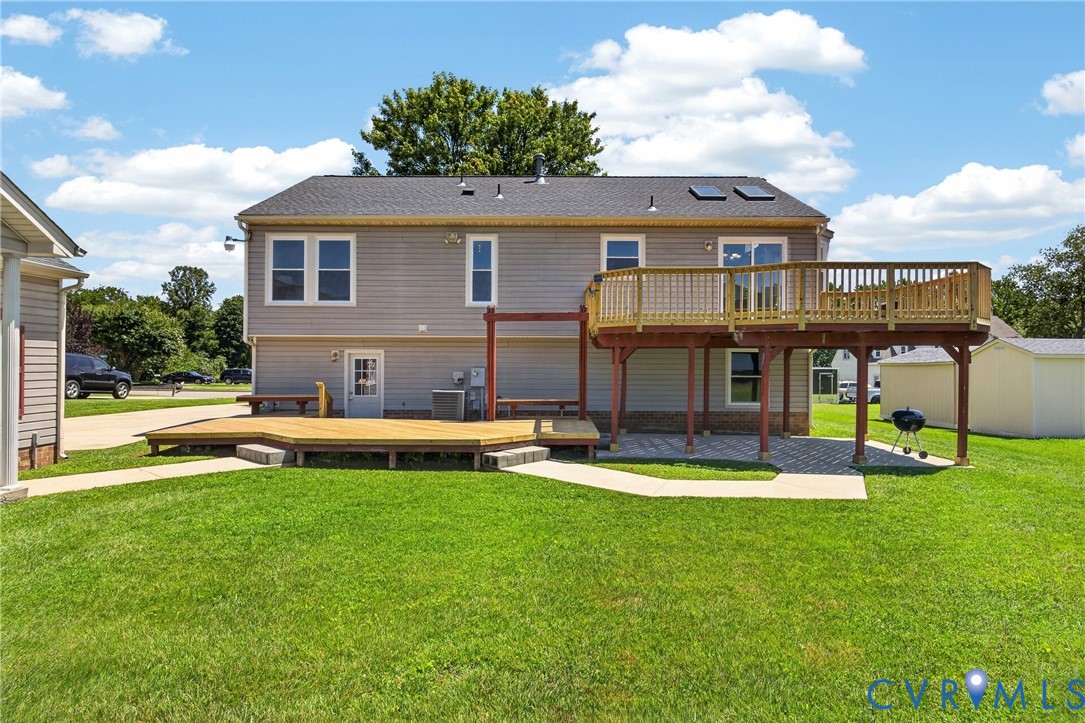 1559 Tree Ridge Road Henrico, VA 23231 - Photo 38 of 40 Rear exterior featuring an elevated wood deck with
