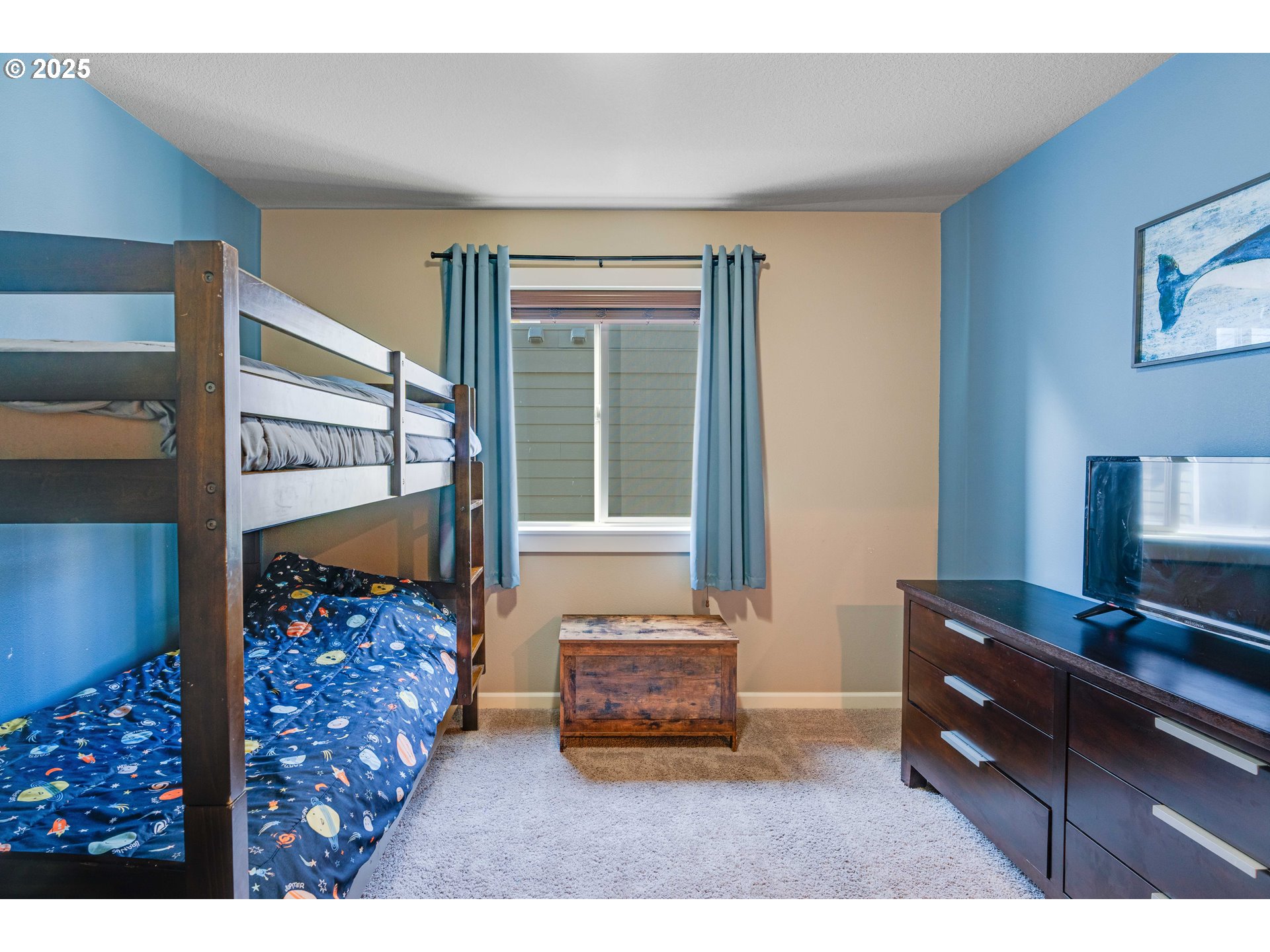514 North 40th Avenue Ridgefield, WA 98642 - Photo 20 of 46 a bedroom with furniture and a window