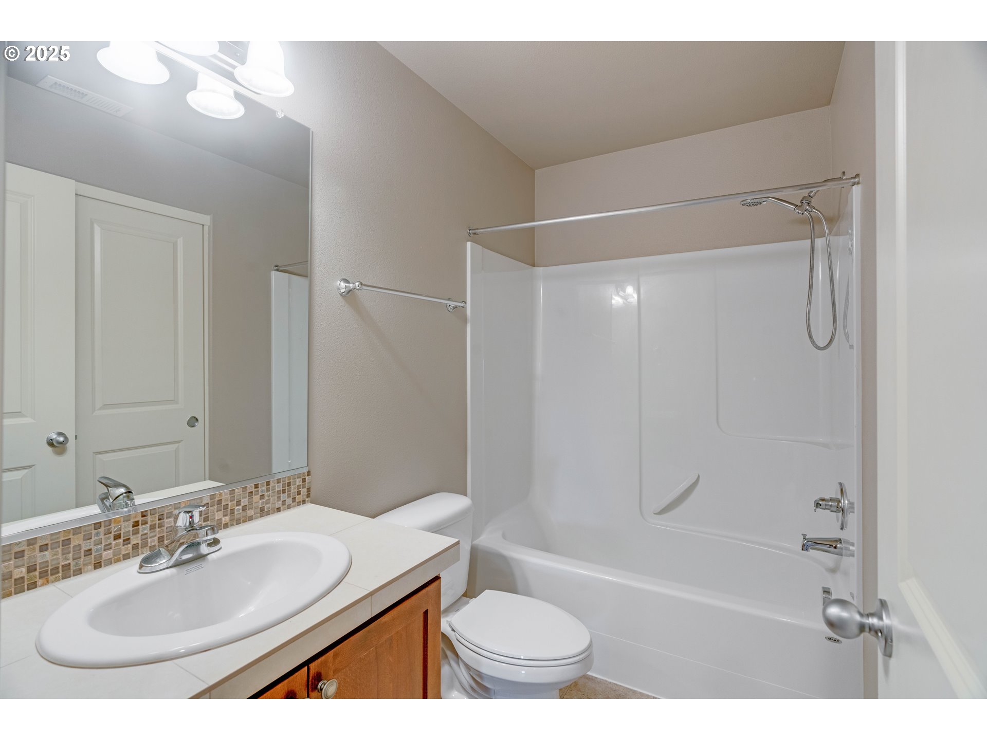 514 North 40th Avenue Ridgefield, WA 98642 - Photo 24 of 46 a bathroom with a sink toilet and shower