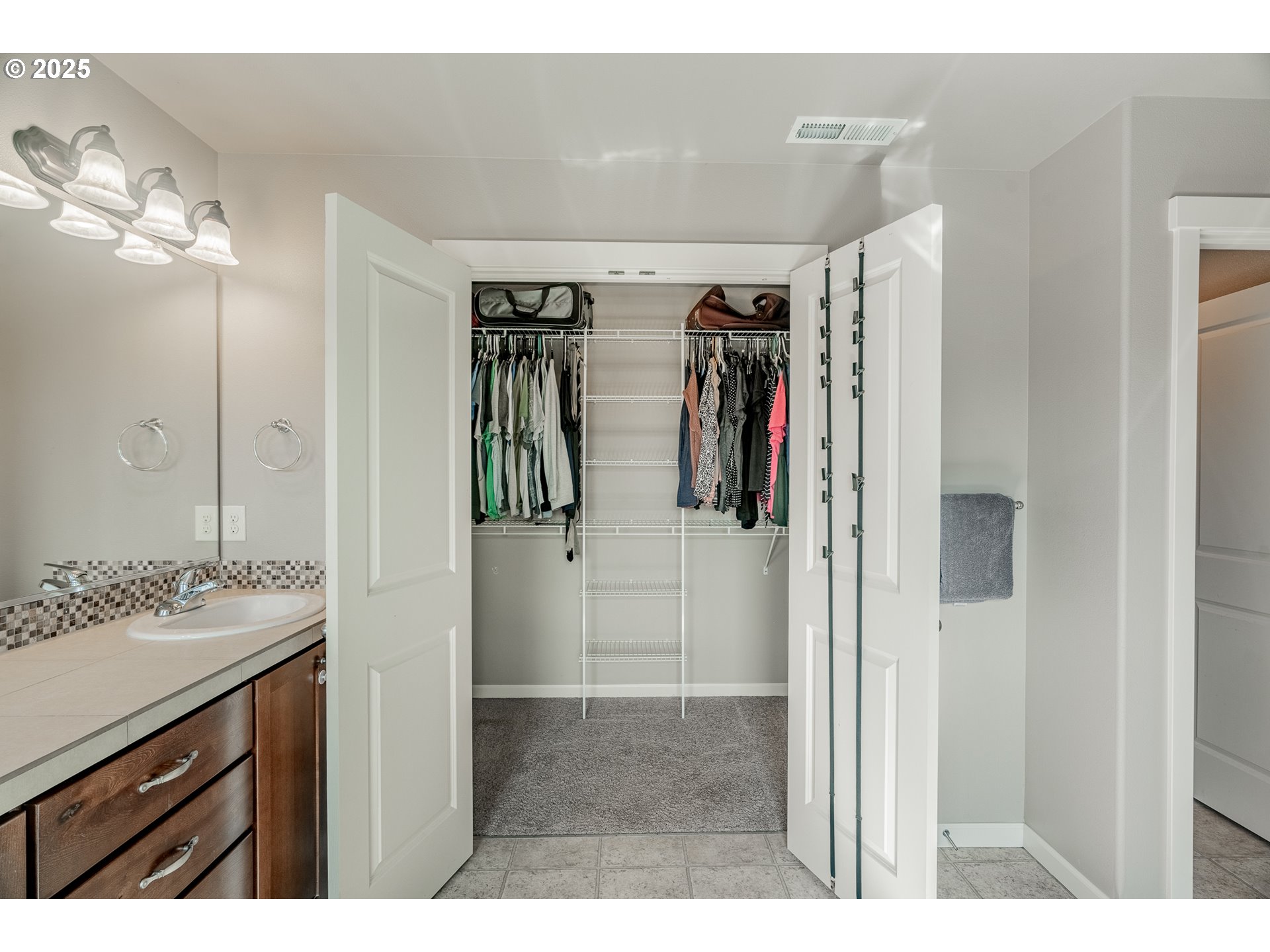 514 North 40th Avenue Ridgefield, WA 98642 - Photo 30 of 46 a bathroom with a sink vanity and shower