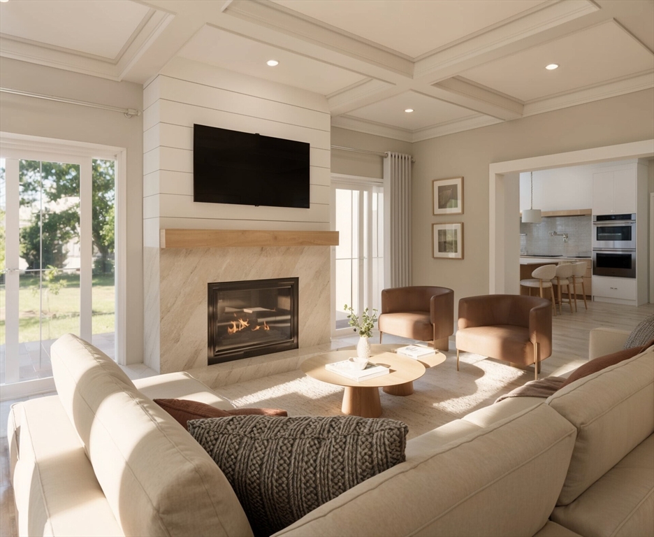 28 Parker Road Wellesley, MA 02482 - Photo 3 of 32 a living room with furniture a fireplace and a flat screen tv