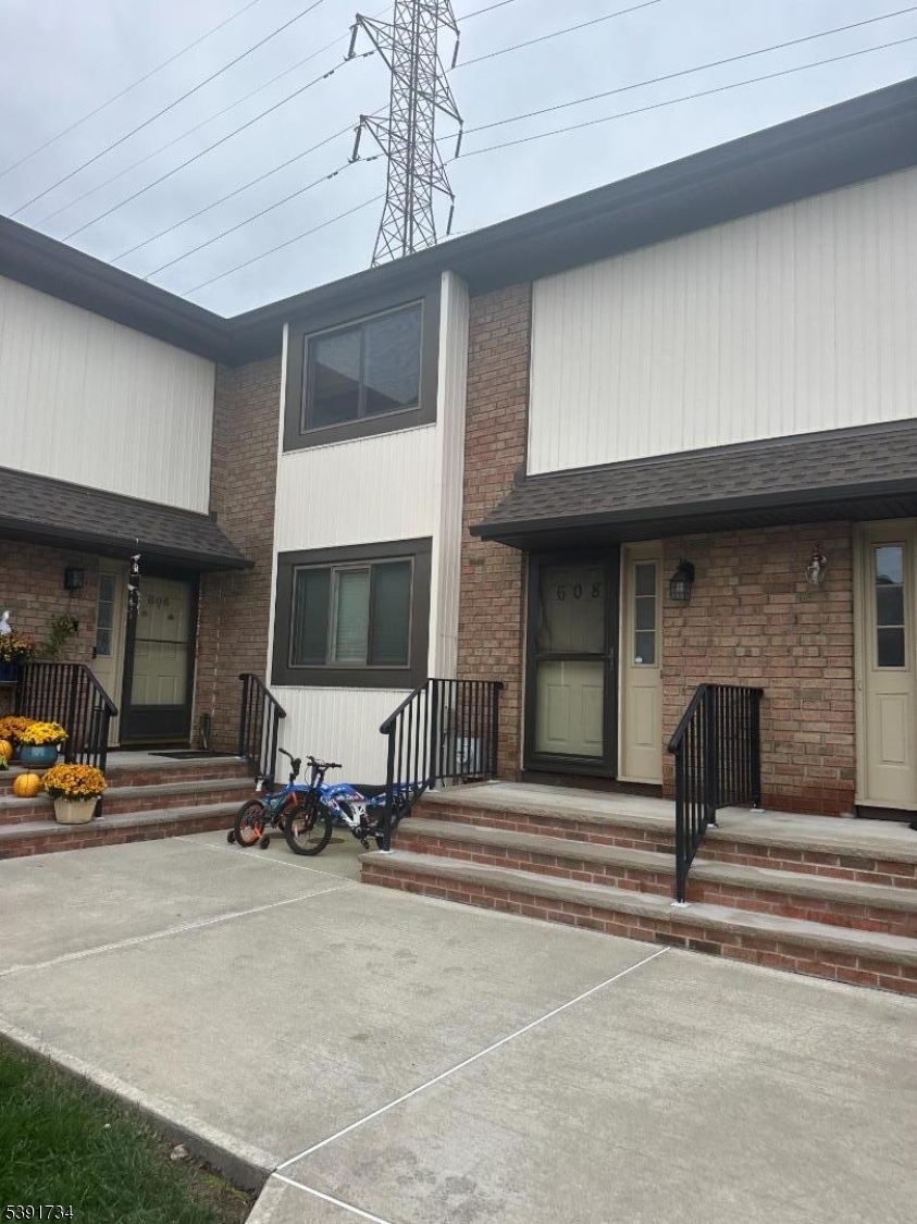 a view of a building with sitting area