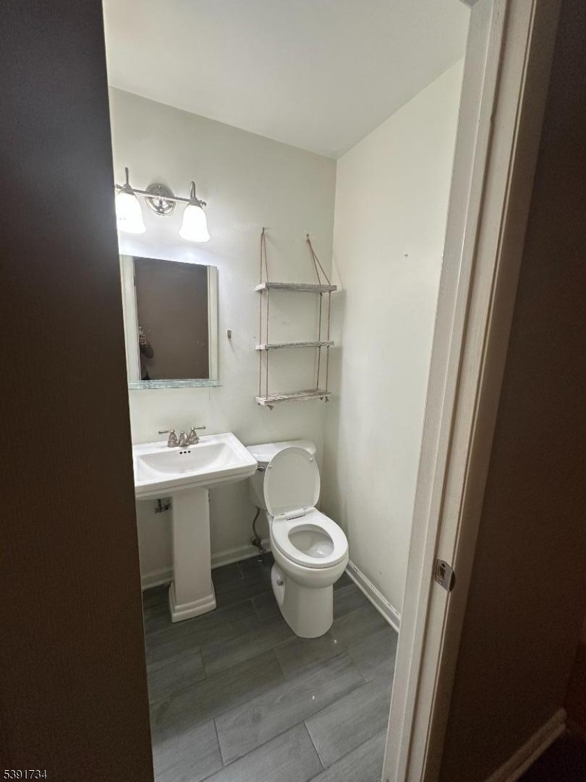 608 Robin Road Hillsborough, NJ 08844 - Photo 4 of 9 a bathroom with a sink toilet and shower