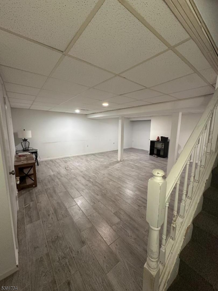 608 Robin Road Hillsborough, NJ 08844 - Photo 5 of 9 a room with lots of white furniture and a rug