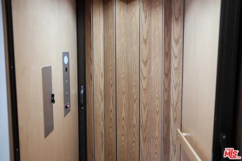 a wooden bench sitting in the middle of a park