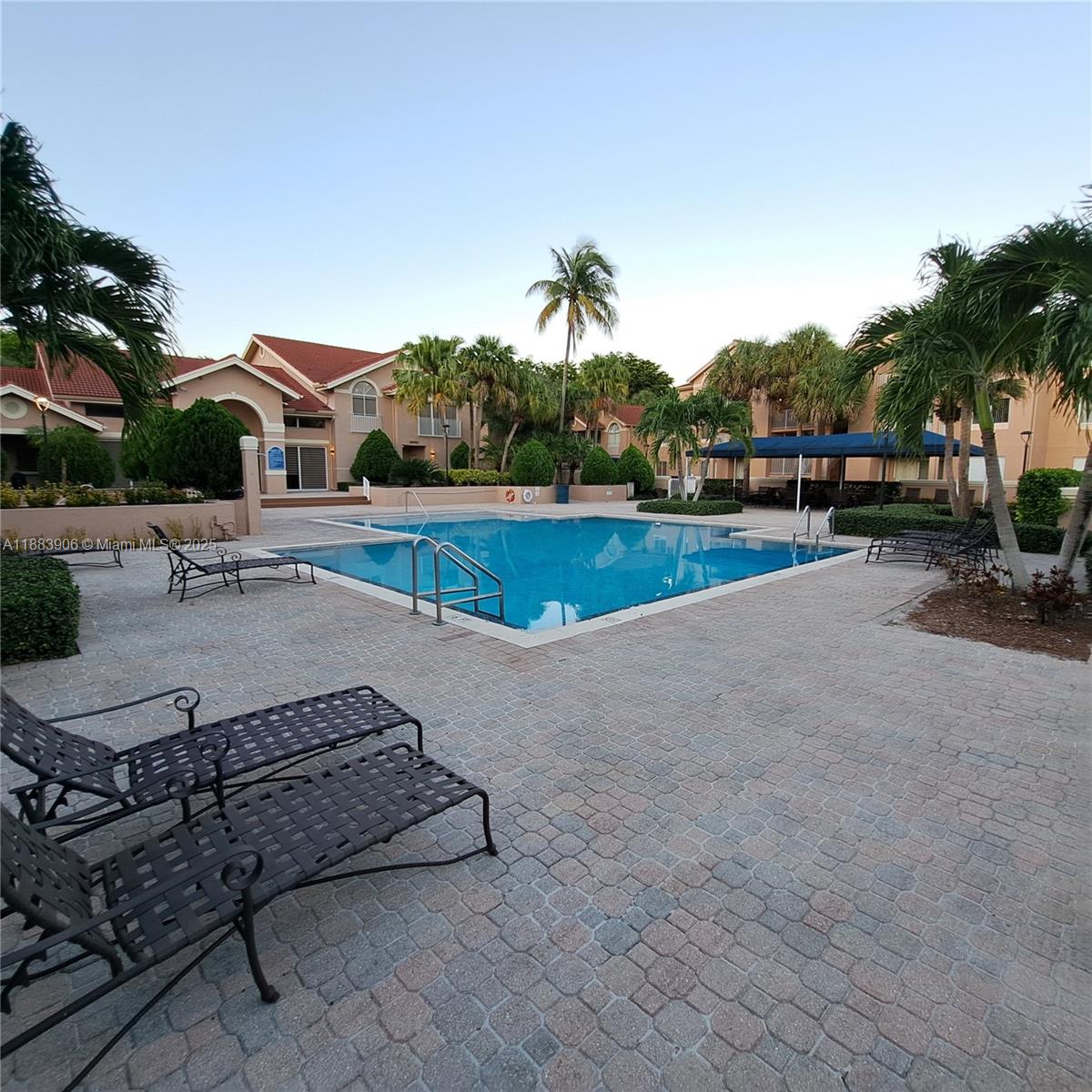 15770 Southwest 106th Terrace, Unit 104 Miami, FL 33196 - Photo 21 of 30 a view of a backyard