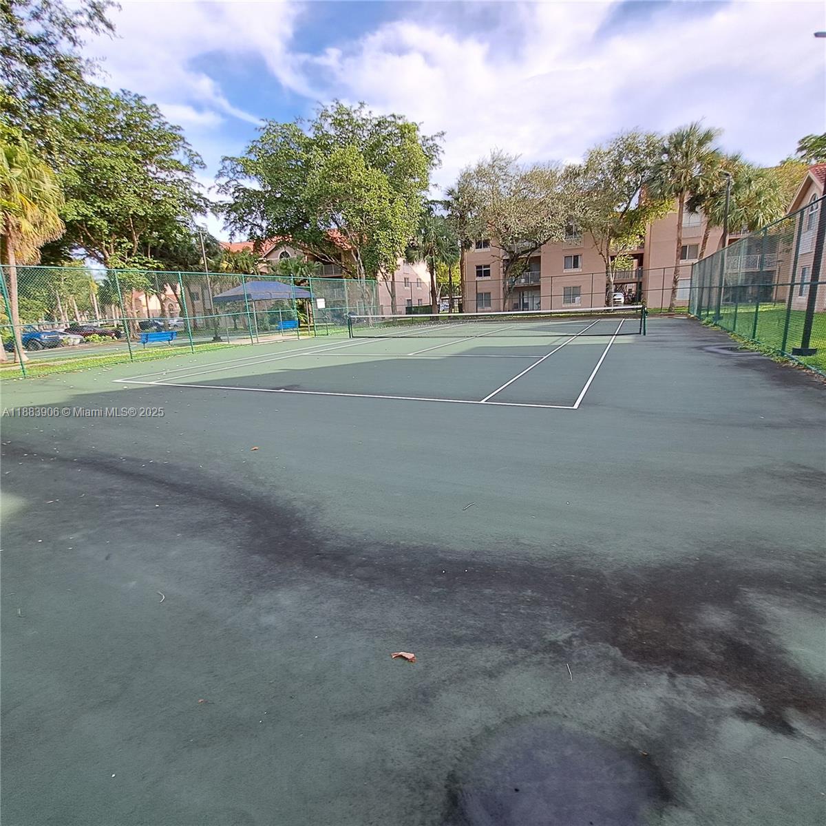 15770 Southwest 106th Terrace, Unit 104 Miami, FL 33196 - Photo 26 of 30 a view of a road with houses