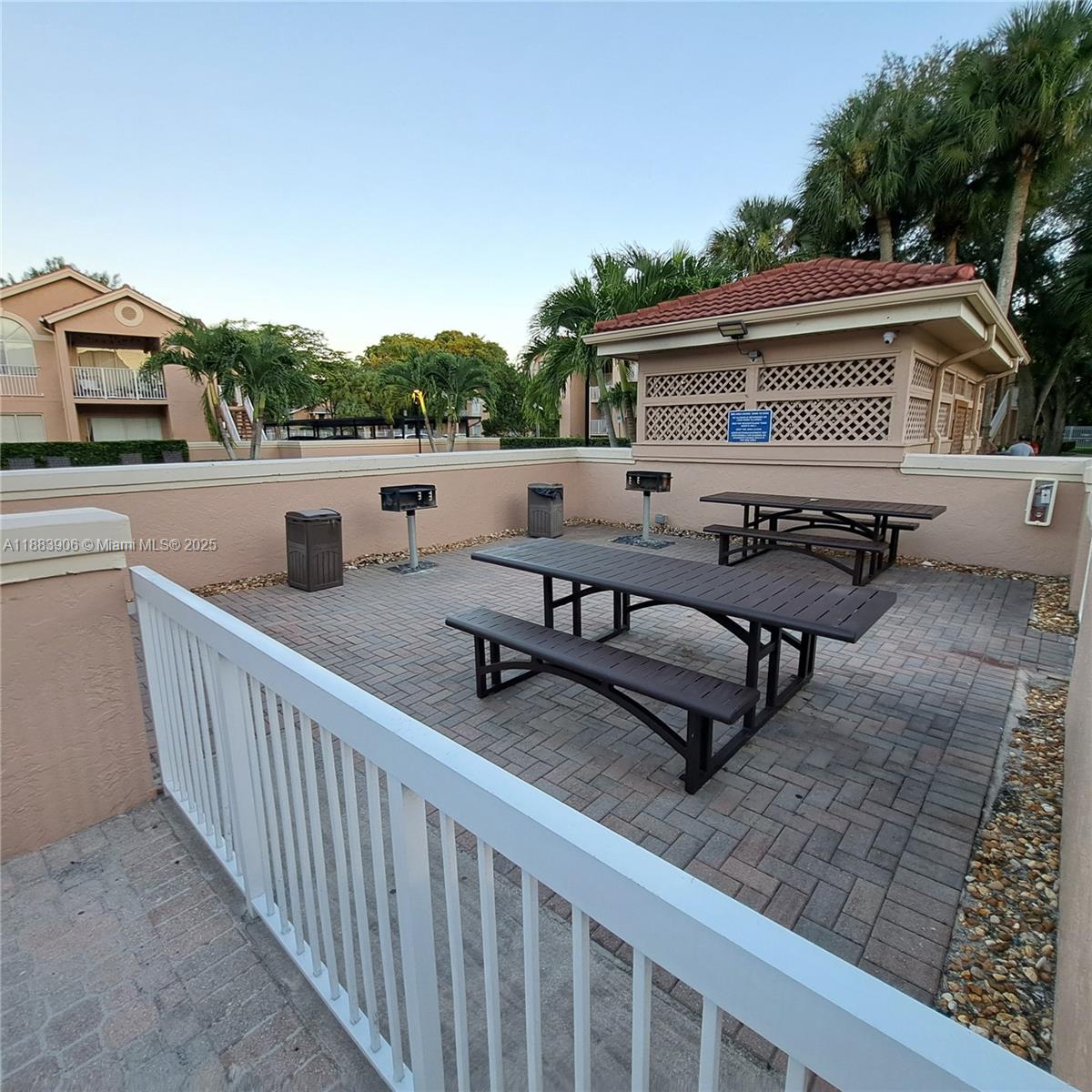 15770 Southwest 106th Terrace, Unit 104 Miami, FL 33196 - Photo 27 of 30 a view of a roof deck with furniture