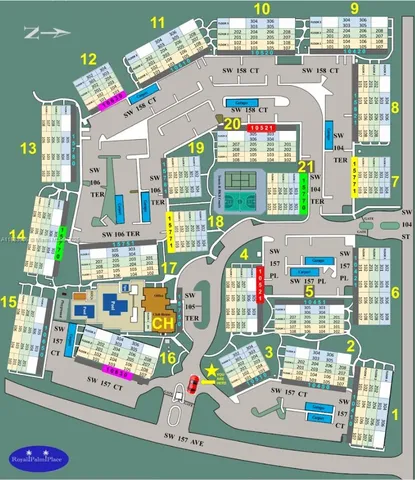 a utility room with fridge table and windows