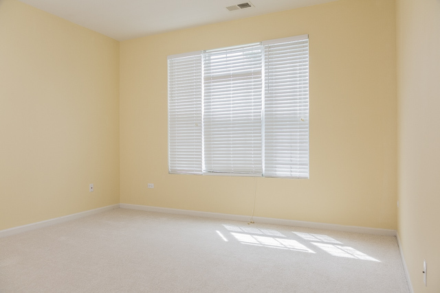 2434 Rolling Ridge Elgin, IL 60124 - Photo 12 of 17 a view of an empty room with a window