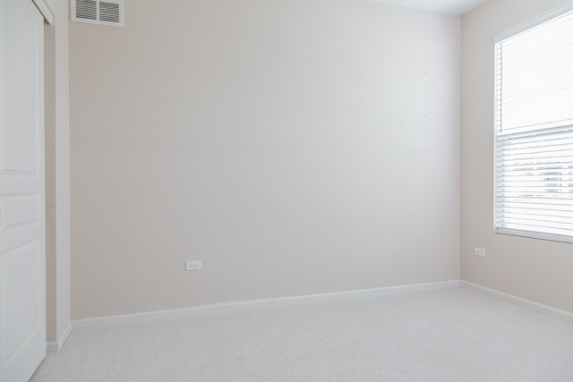2434 Rolling Ridge Elgin, IL 60124 - Photo 14 of 17 a view of an empty room with a window