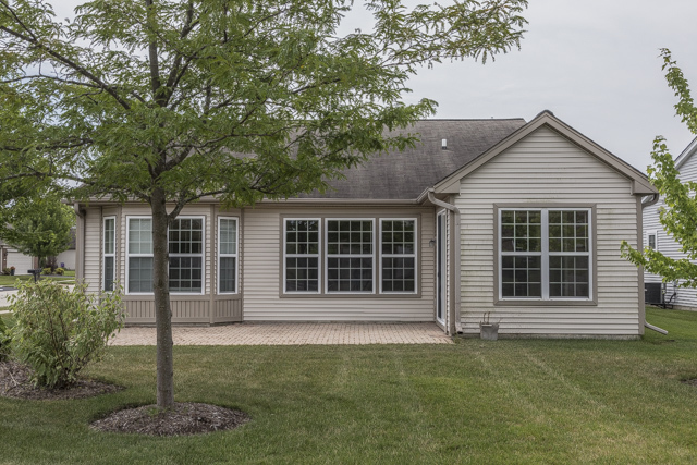 2434 Rolling Ridge Elgin, IL 60124 - Photo 17 of 17 front view of a house with a yard