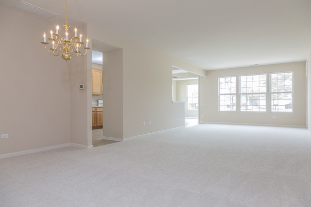 2434 Rolling Ridge Elgin, IL 60124 - Photo 3 of 17 a view of an empty room with a window