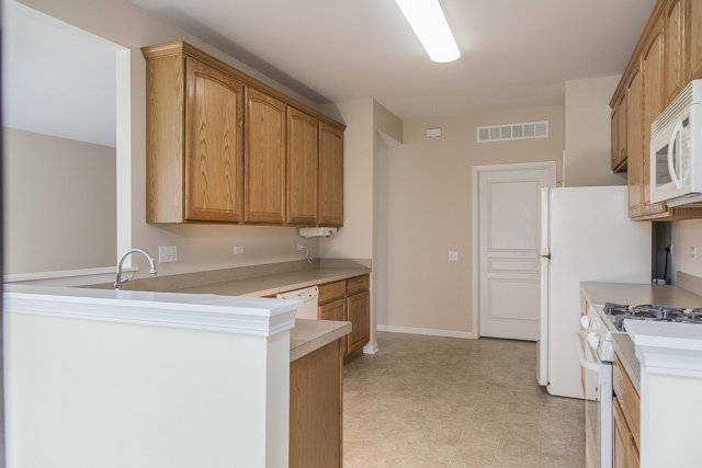 2434 Rolling Ridge Elgin, IL 60124 - Photo 5 of 17 a room with a sink cabinets and utility