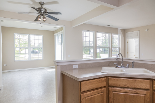 2434 Rolling Ridge Elgin, IL 60124 - Photo 6 of 17 a bathroom with a sink and a window