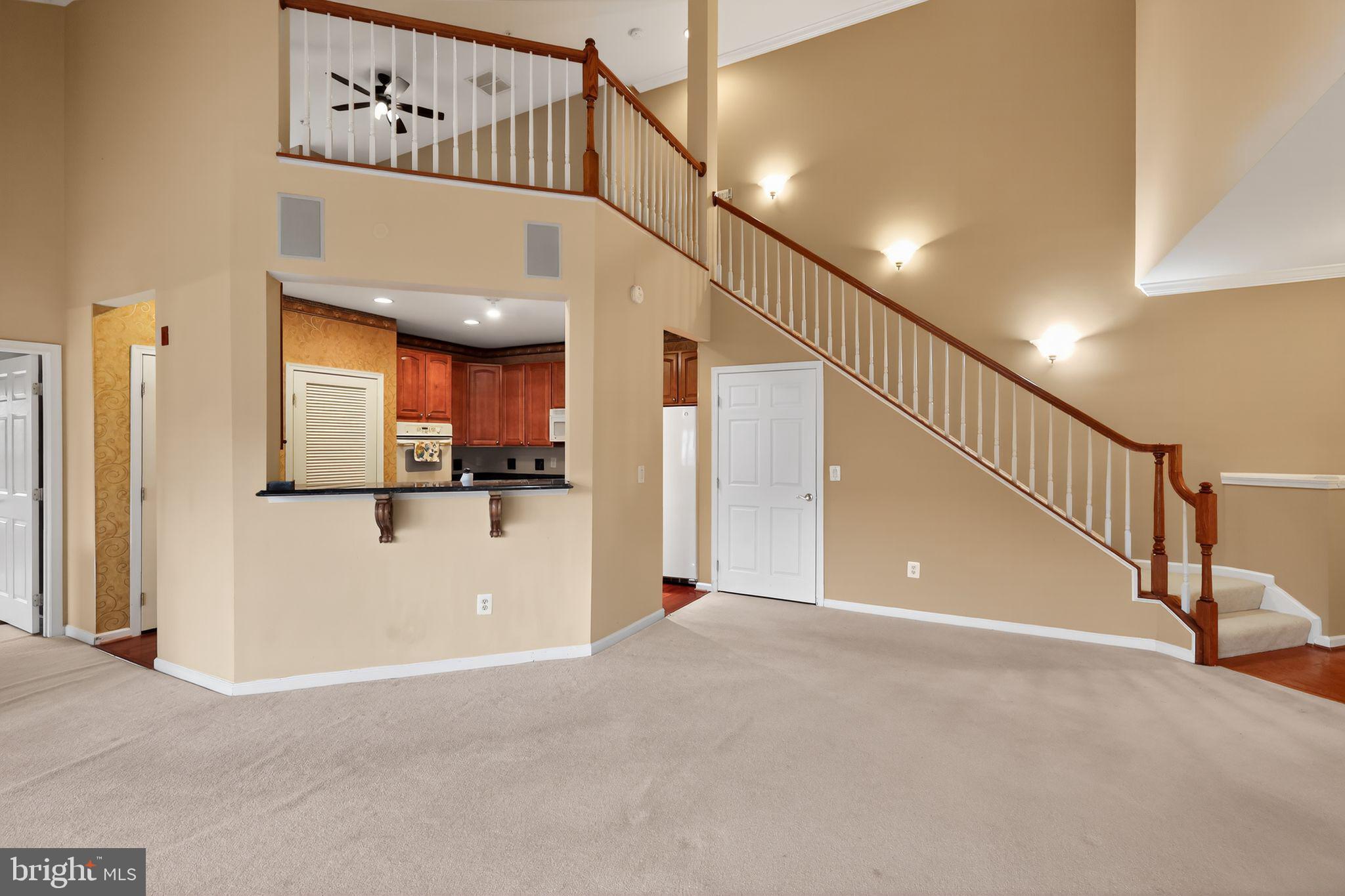 2007 Connor Court, Unit 701J Bowie, MD 20721 - Photo 5 of 15 a view of a hallway with entryway and stairs