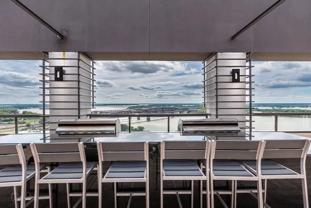 a kitchen with a table and chairs in it
