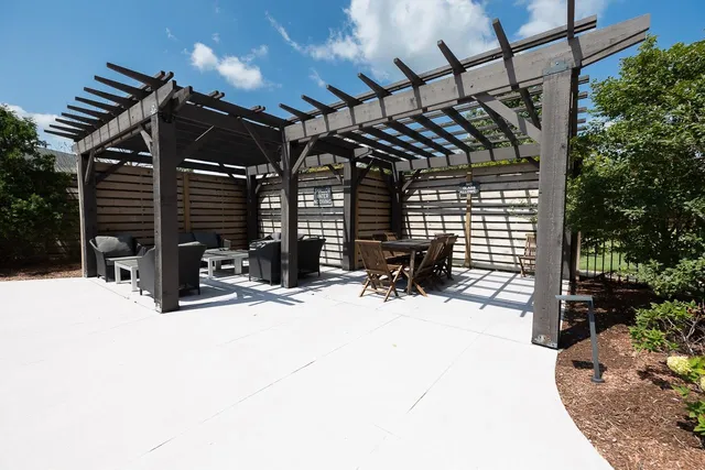 a view of chairs and tables in patio