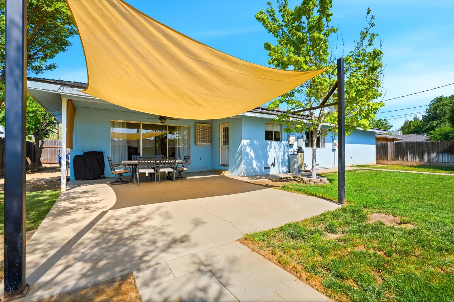 289 West Cypress Avenue Reedley, CA 93654 - Photo 36 of 45 a house view with a sitting space and garden