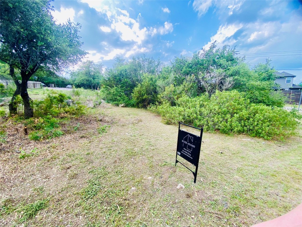 3120 Geronimo Trail Austin, TX 78734 - Photo 1 of 10 a view of a street with trees in the background