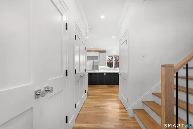 a view of a bathroom with a tub and shower