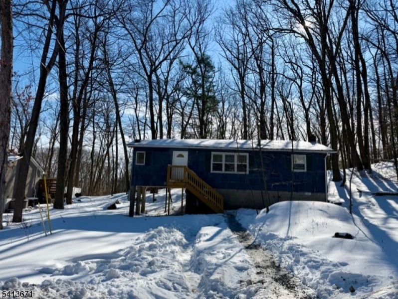 56 Appleseed Road Vernon, NJ 07461 - Photo 4 of 7 a view of a house with snow on the floor