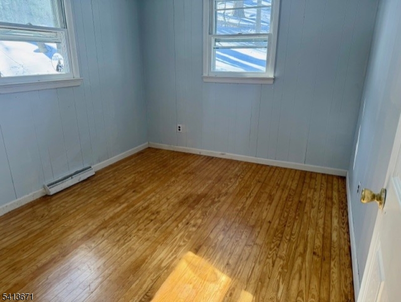 56 Appleseed Road Vernon, NJ 07461 - Photo 5 of 7 an empty room with windows