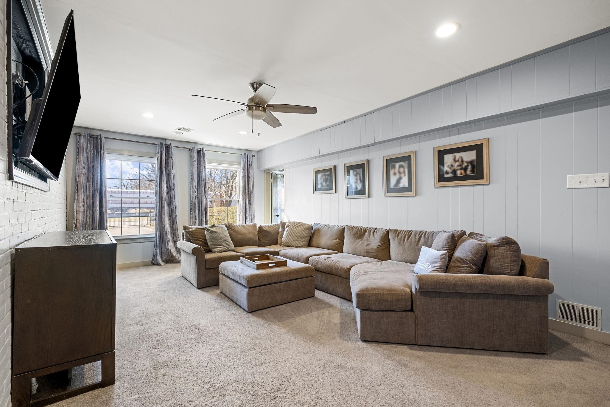 4120 Village Road Memphis, TN 38117 - Photo 13 of 28 Living room featuring ceiling fan, light carpet, and recessed lighting