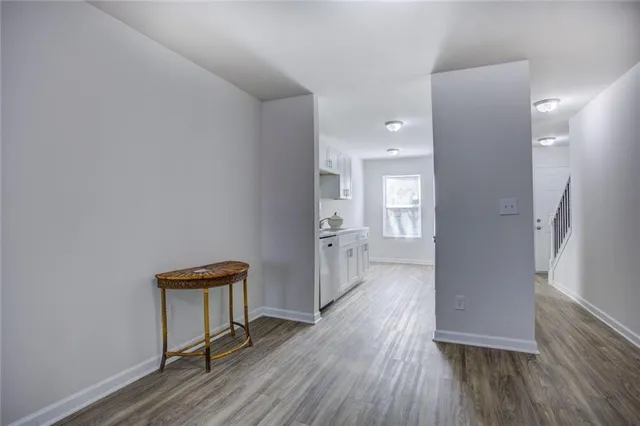 a kitchen with stainless steel appliances granite countertop a stove and a refrigerator