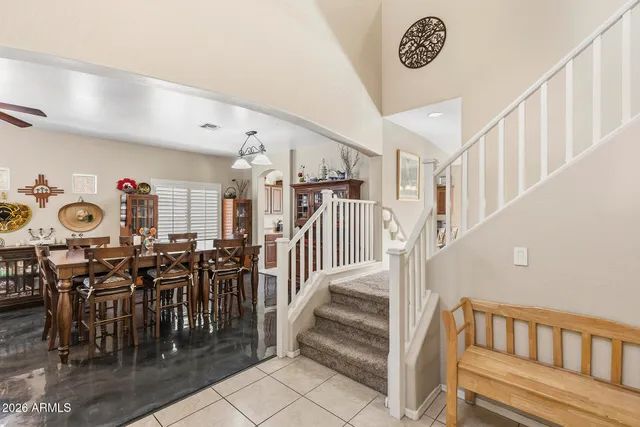 a view of walk in closet with clothes