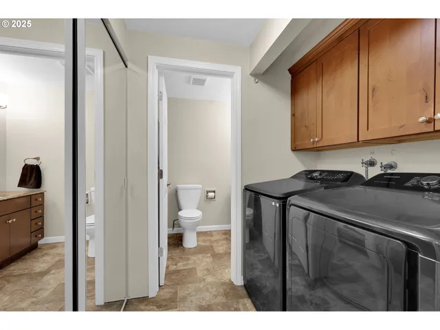 a view of a bathroom with a sink and mirror