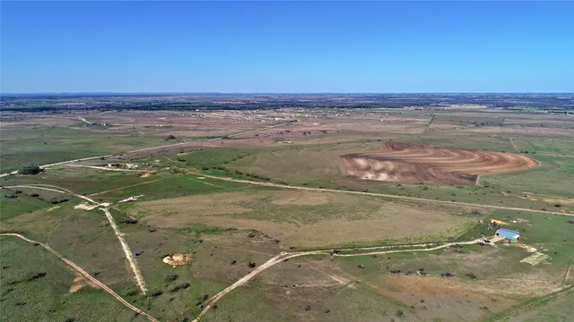 an aerial view of beach with ocean view