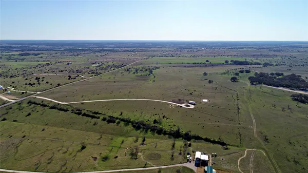 an aerial view of beach with ocean view