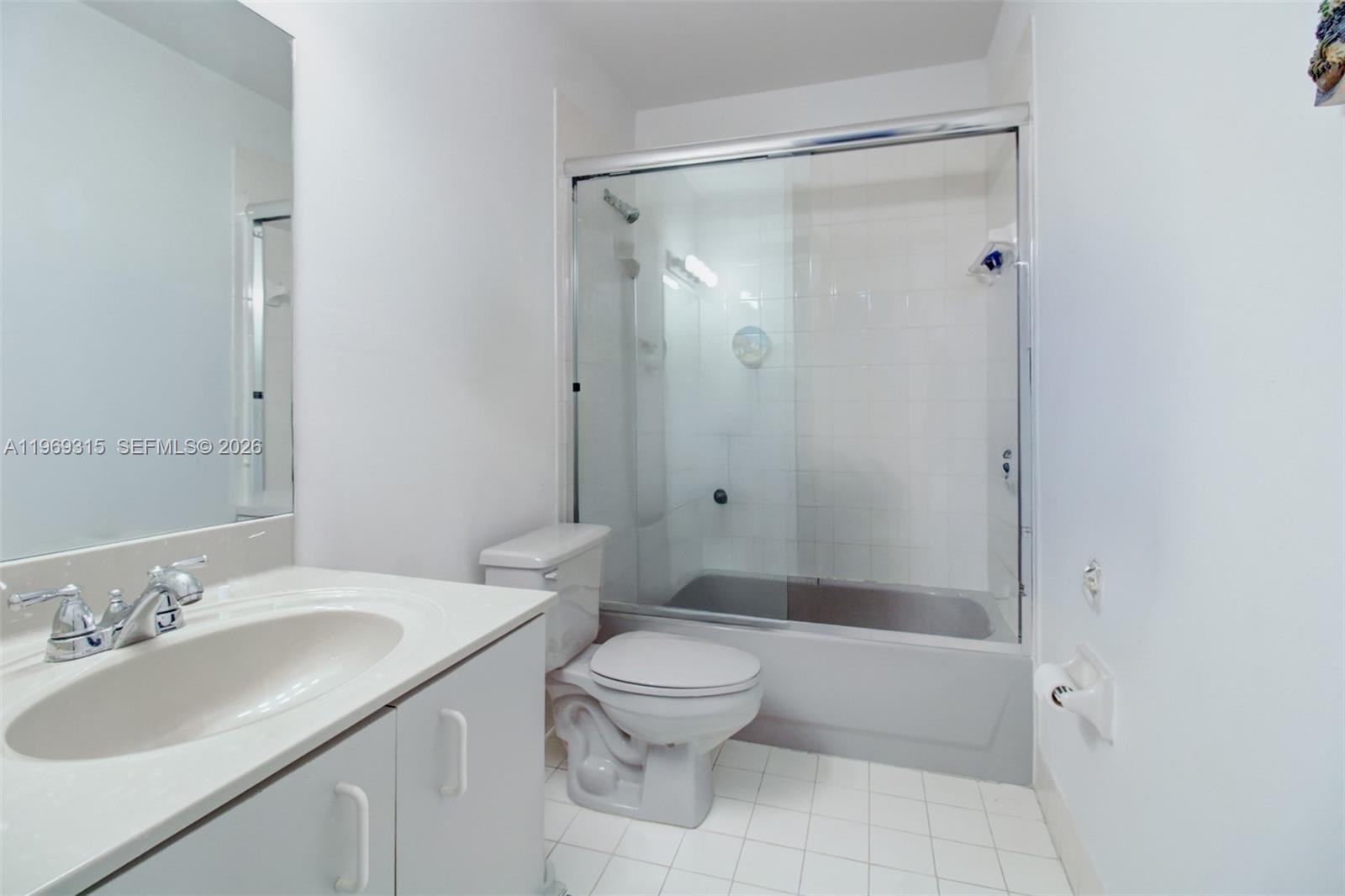 15490 Southwest 47th Street Miami, FL 33185 - Photo 25 of 43 a bathroom with a sink toilet and shower