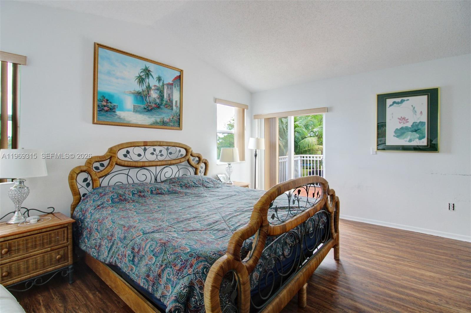 15490 Southwest 47th Street Miami, FL 33185 - Photo 27 of 43 a bedroom with a bed next to a window