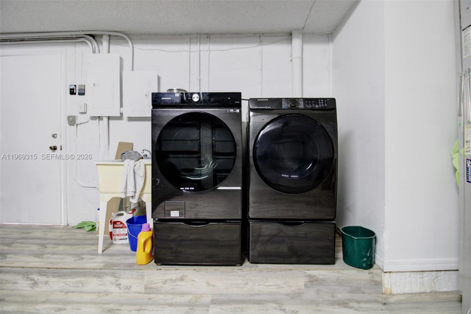 15490 Southwest 47th Street Miami, FL 33185 - Photo 32 of 43 a utility room with dryer and washer