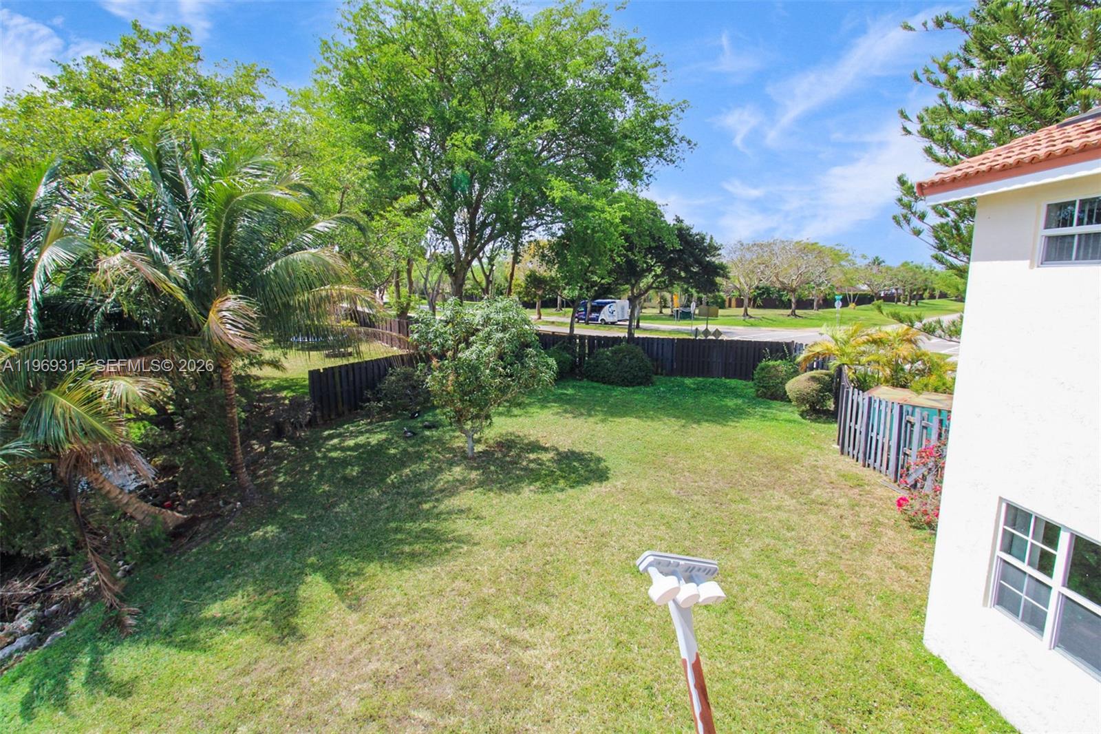 15490 Southwest 47th Street Miami, FL 33185 - Photo 34 of 43 a view of swimming pool with seating space