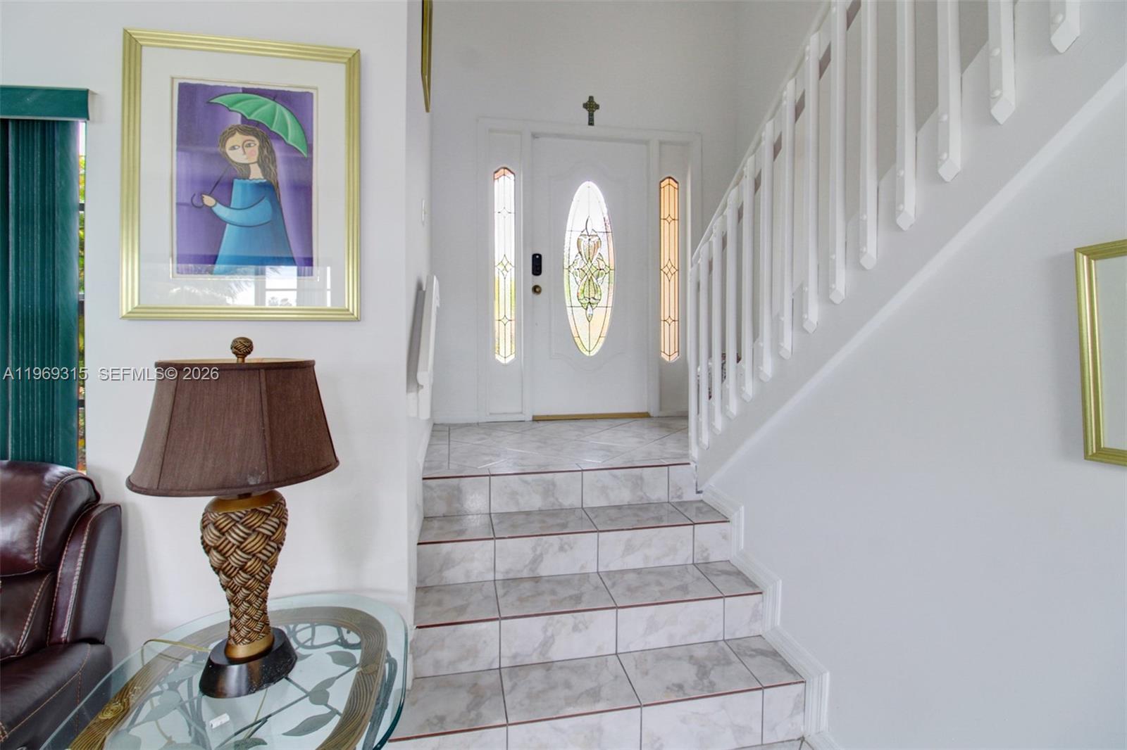 15490 Southwest 47th Street Miami, FL 33185 - Photo 10 of 43 a view of entryway and hall with wooden floor