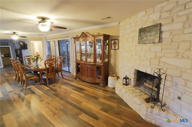 a view of a livingroom with furniture and a fireplace
